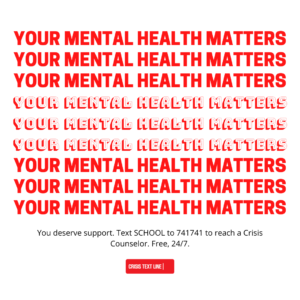 Social media post for schools. Text reads "Socially distant, but not alone. Your mental health matters. Text SCHOOL to 741741 for free, 24/7 crisis counseling." Below the copy is an illustration of a hand typing on a phone